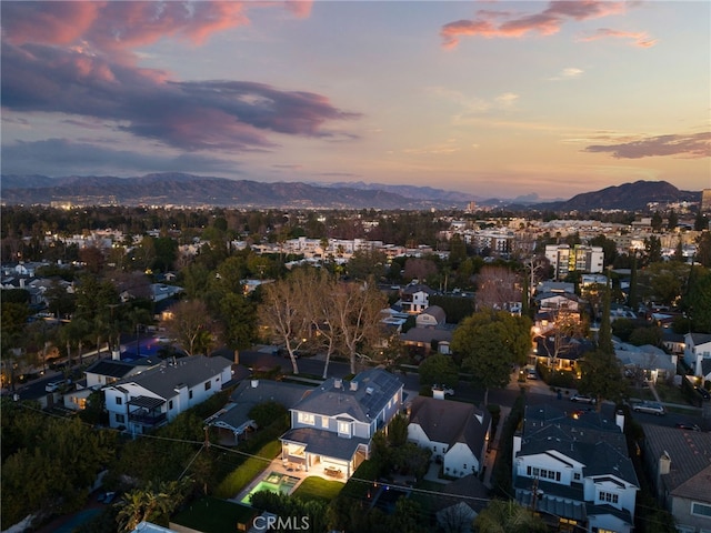 birds eye view of property featuring a residential view and a mountain view