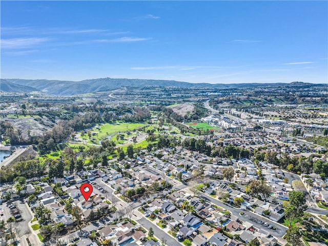 birds eye view of property with a residential view and a mountain view