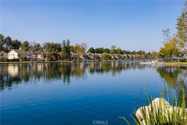 property view of water featuring a residential view