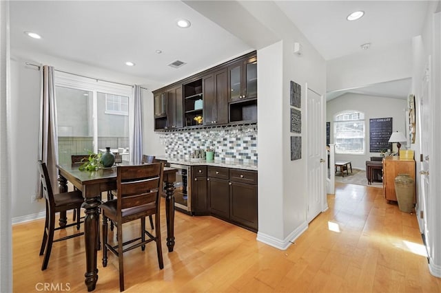 bar featuring recessed lighting, wine cooler, visible vents, light wood-style floors, and tasteful backsplash