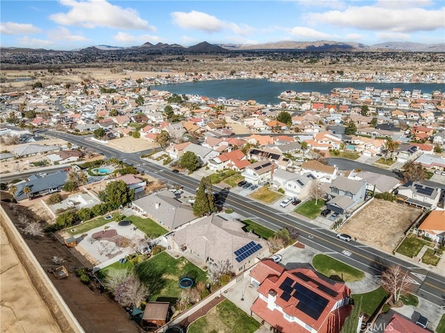 drone / aerial view with a residential view and a mountain view