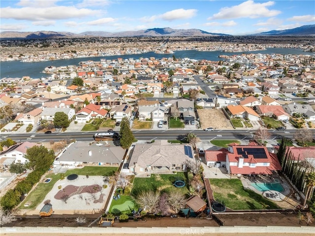 birds eye view of property featuring a residential view and a mountain view