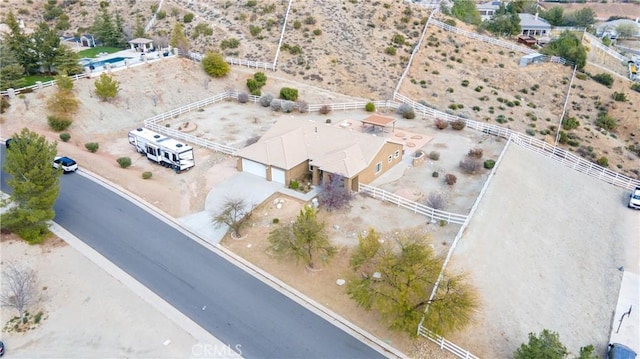 drone / aerial view with a desert view