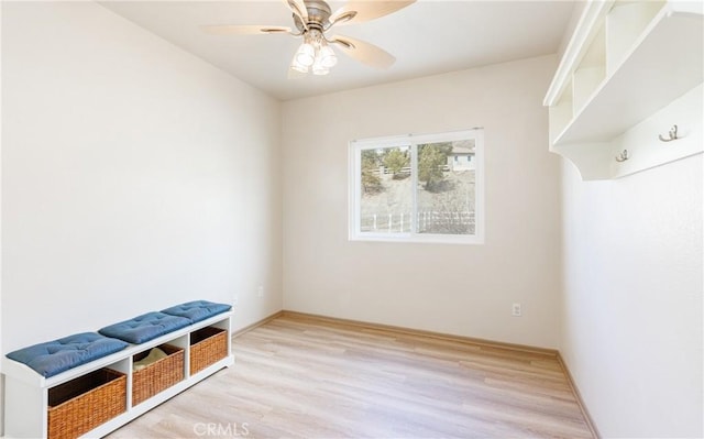 mudroom with light wood finished floors and ceiling fan