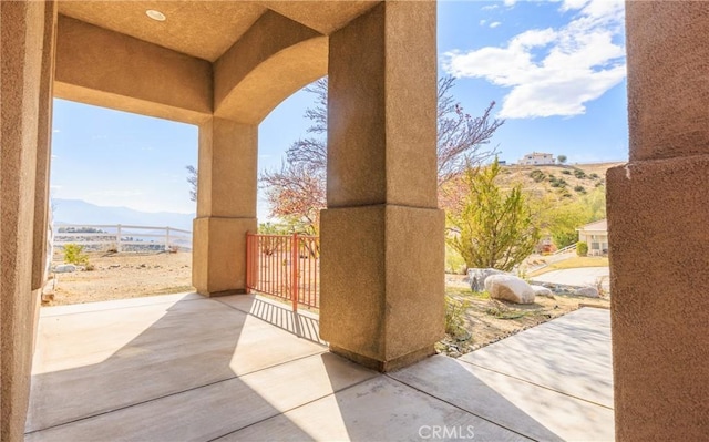 view of patio with a mountain view