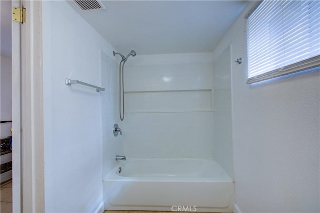 full bathroom featuring visible vents and shower / bathing tub combination