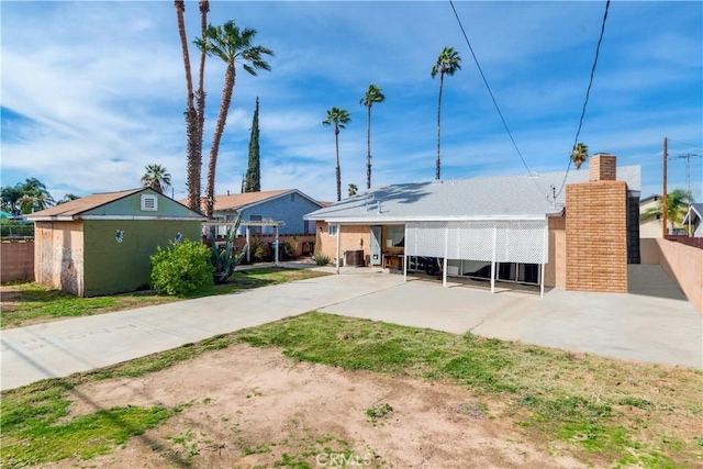 exterior space with a patio area and fence