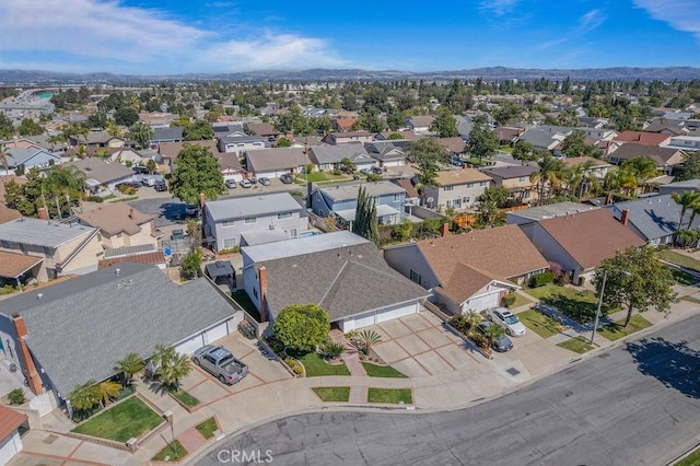 birds eye view of property with a residential view