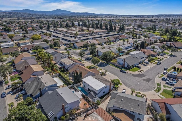 bird's eye view with a residential view and a mountain view