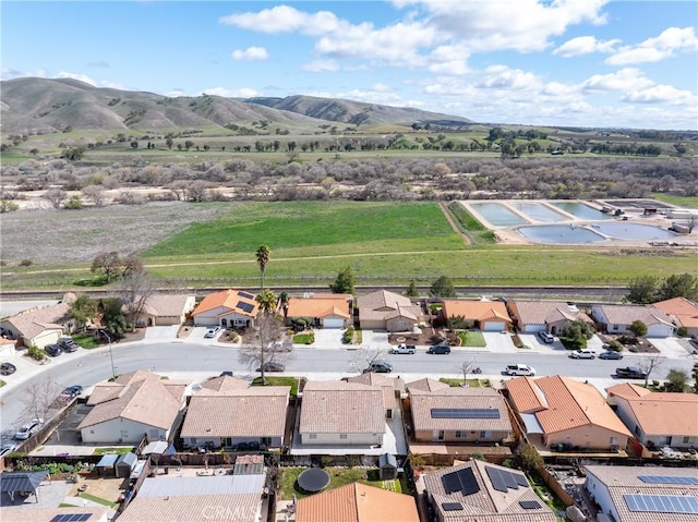 aerial view with a residential view and a mountain view