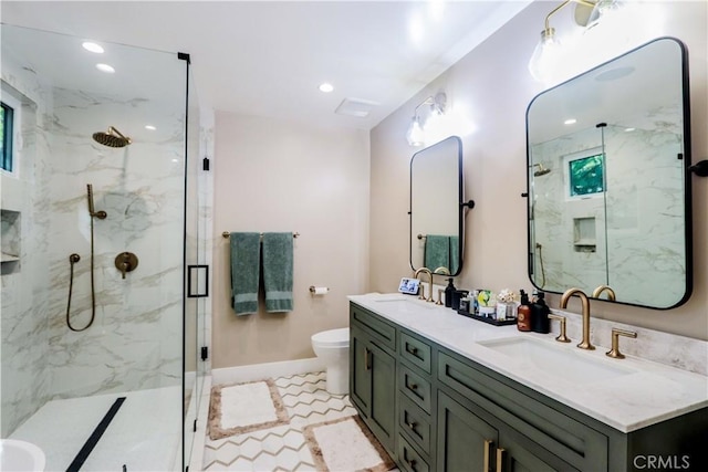 full bathroom with a marble finish shower, recessed lighting, toilet, and a sink