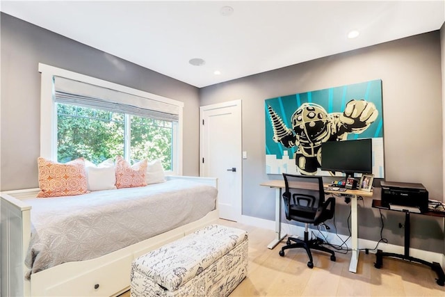 bedroom featuring recessed lighting, baseboards, and wood finished floors