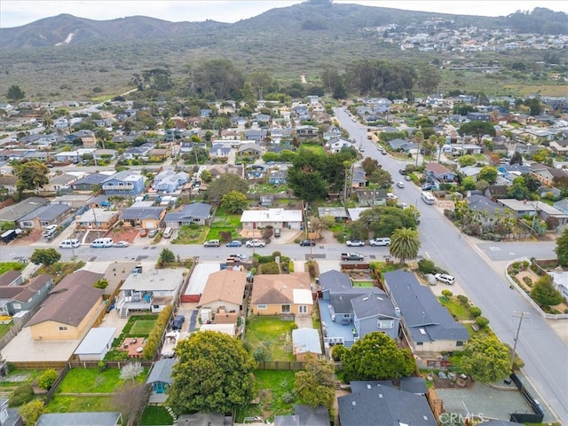 drone / aerial view with a residential view and a mountain view