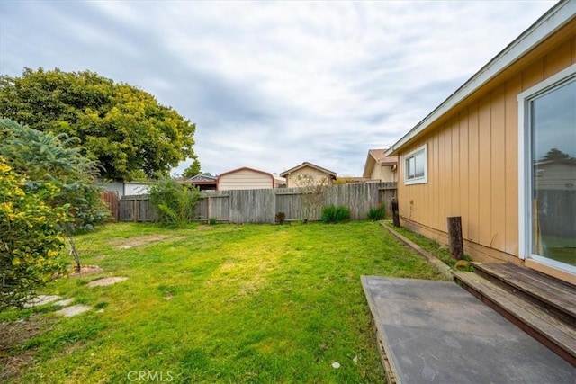 view of yard featuring a fenced backyard