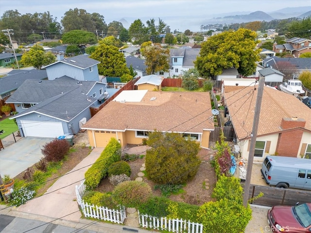 bird's eye view featuring a mountain view and a residential view