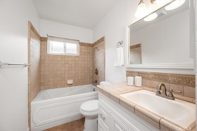 full bathroom with shower / bathtub combination, vanity, toilet, and tile patterned floors