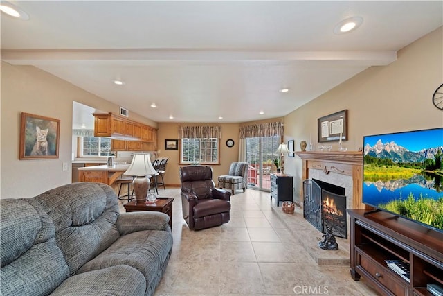 living room featuring light tile patterned floors, visible vents, a fireplace, beam ceiling, and recessed lighting