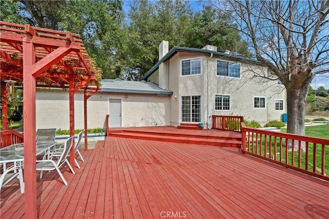 deck featuring a pergola