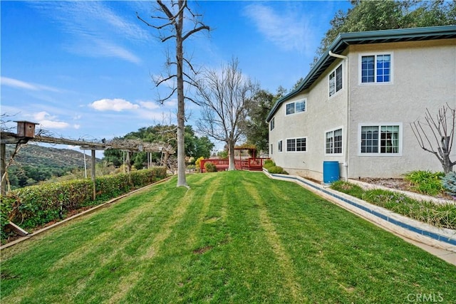 view of yard featuring a deck