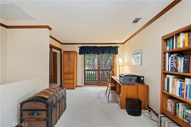 office area with visible vents, crown molding, and light colored carpet