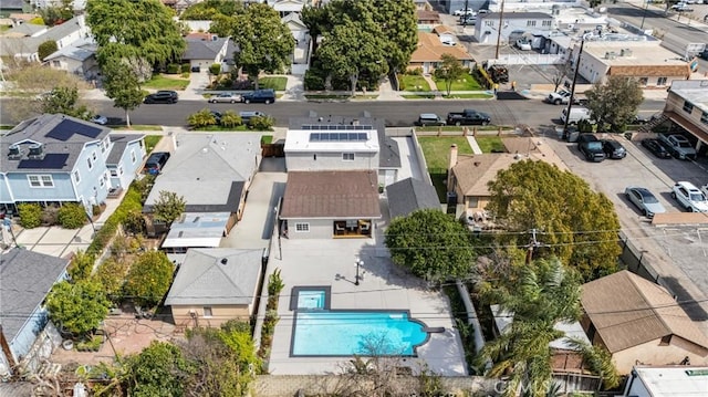 birds eye view of property with a residential view