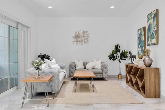 living area with tile patterned flooring and recessed lighting