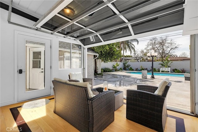 view of patio / terrace with a fenced backyard, a fenced in pool, and an outdoor hangout area