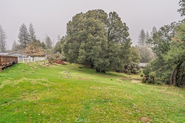 view of yard with fence