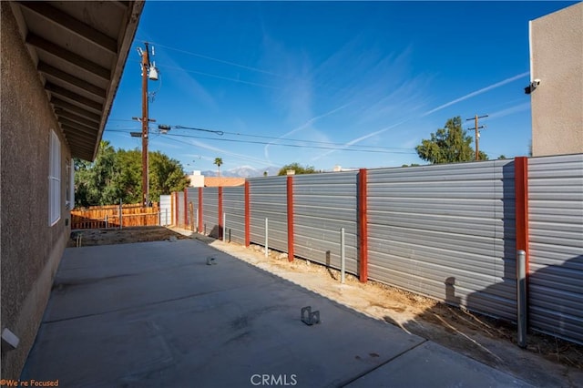 view of patio with a fenced backyard