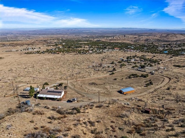 drone / aerial view featuring view of desert