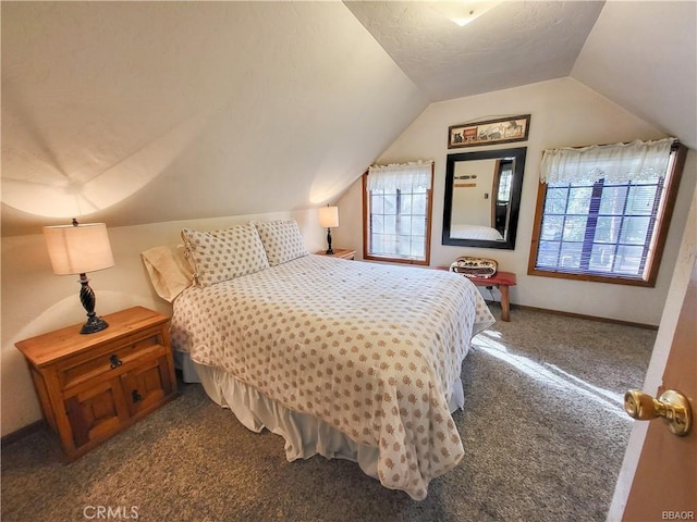 carpeted bedroom featuring baseboards, vaulted ceiling, and a textured ceiling