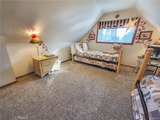 carpeted bedroom featuring vaulted ceiling and baseboards