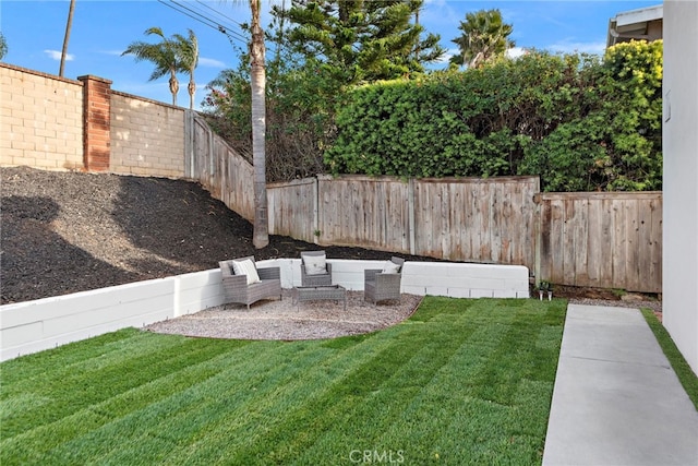 view of yard with a fenced backyard