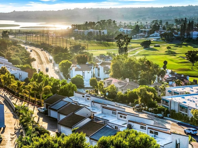 birds eye view of property with a residential view and golf course view