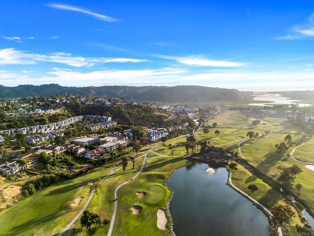 bird's eye view featuring golf course view and a water and mountain view