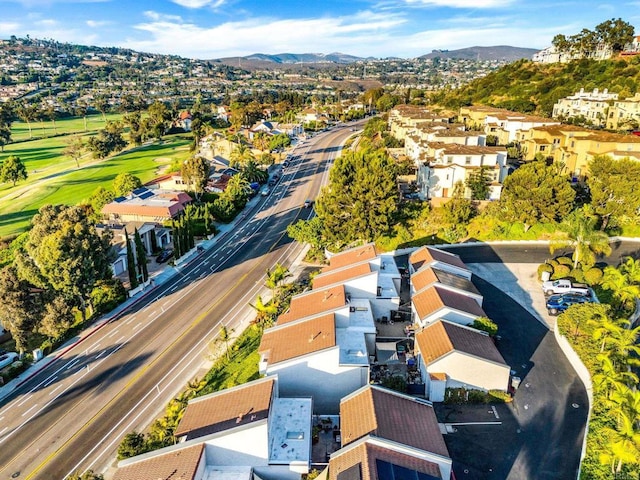 birds eye view of property with a residential view and a mountain view