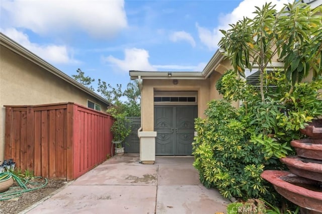 garage featuring fence