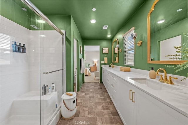 34720 Mustang Ln, Fallbrook, CA 92028 - ensuite bathroom featuring vanity, a shower stall, recessed lighting, and stone finish flooring