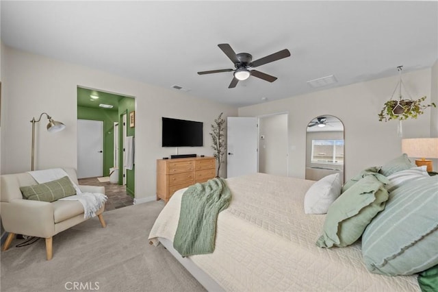 bedroom with carpet, visible vents, ceiling fan, and baseboards