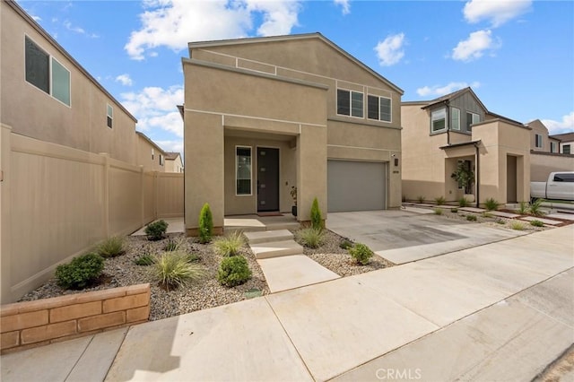 34720 Mustang Ln, Fallbrook, CA 92028 - view of front facade featuring stucco siding, concrete driveway, and a garage