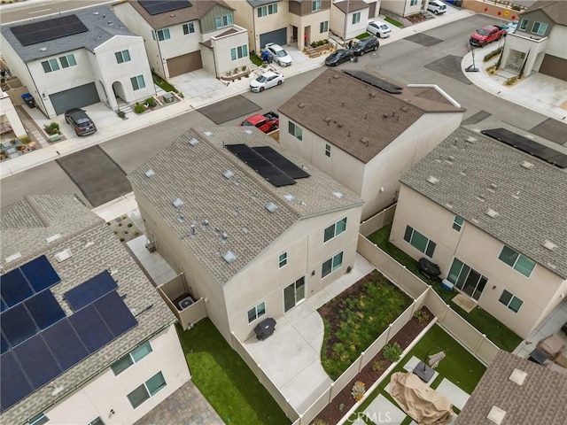 birds eye view of property with a residential view