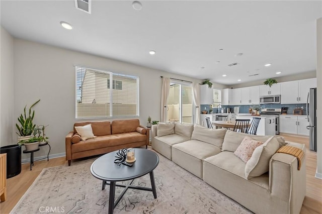 34720 Mustang Ln, Fallbrook, CA 92028 - living area featuring recessed lighting and light wood-style floors