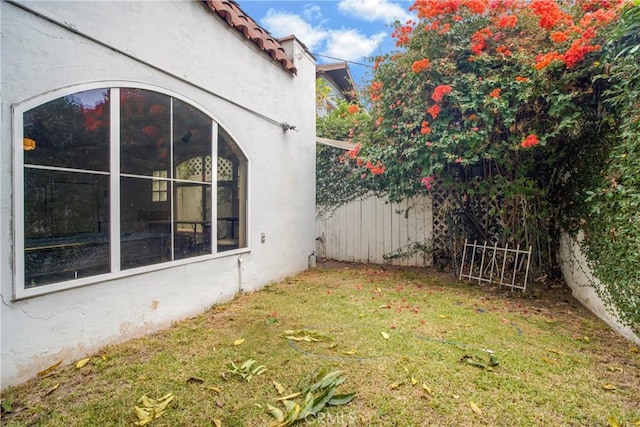 view of yard with fence