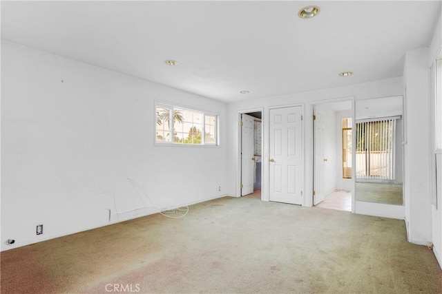 unfurnished bedroom featuring carpet floors