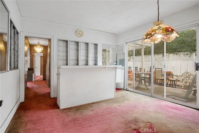 unfurnished sunroom featuring a healthy amount of sunlight