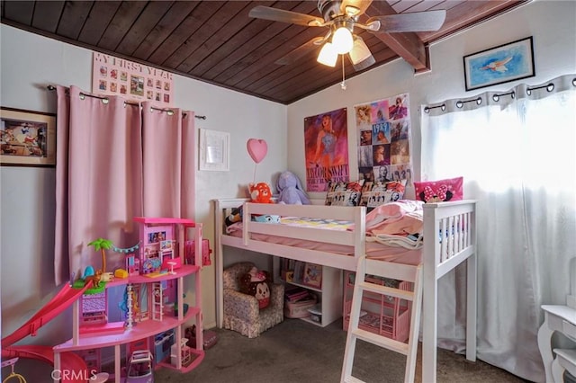 bedroom featuring wooden ceiling and carpet flooring