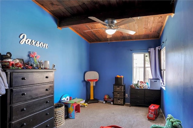 bedroom with carpet floors, ornamental molding, wooden ceiling, and a ceiling fan