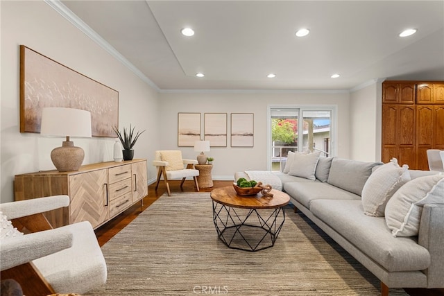 living area with dark wood-style floors, baseboards, crown molding, and recessed lighting