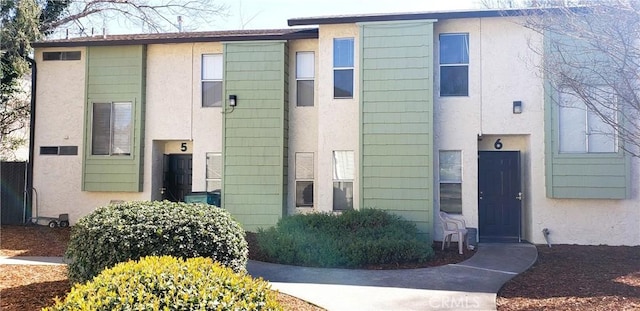 view of property with stucco siding