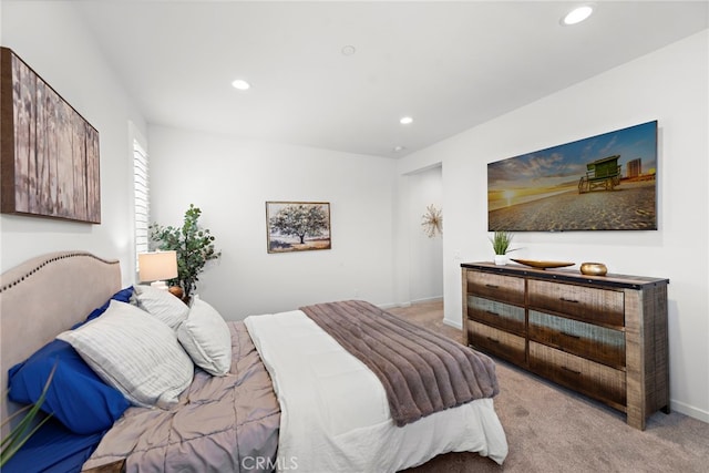 bedroom featuring baseboards, carpet floors, and recessed lighting